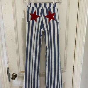 Free people flare jeans stripped with stars on butt